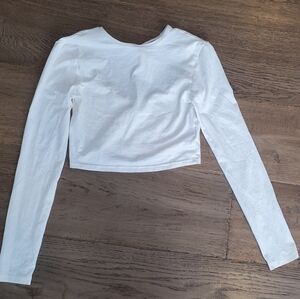 Layer top open back crop